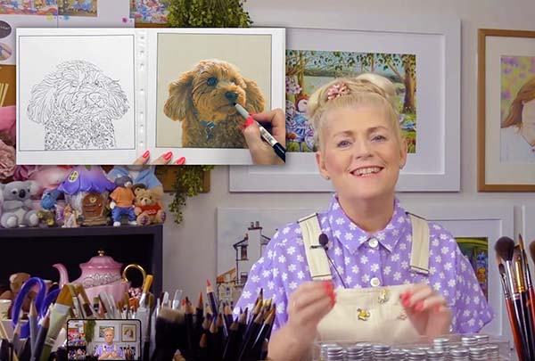 Cindy Wider Artist at her desk in her studio