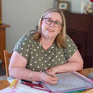 Peta Turn sitting at Art Desk