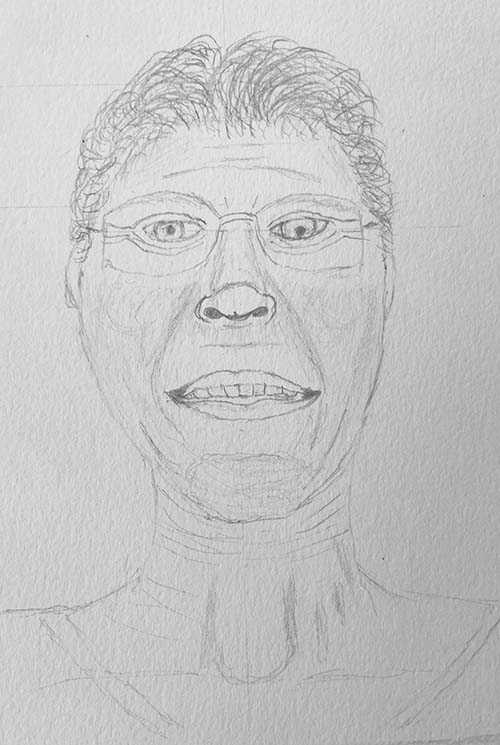 Artist Cindy Wider sitting on a chair drawing